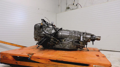 JDM Subaru Outback 2004-2005 3.0L automatic transmission on display, includes 90-day warranty.